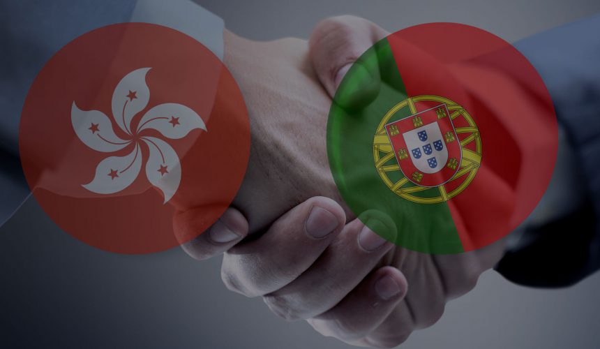 bandeiras de Hong Kong e Portugal com aperto de mão